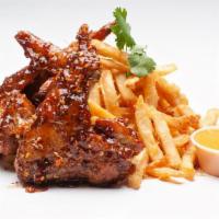 Sticky Wings (3Pcs) & Fries · 3PCS Jumbo whole wings tossed in our homemade sticky sauce, garnished with chili garlic crun...