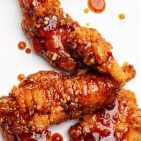 Sticky Tenders (8Oz) · 3 PCS Jumbo Chicken breast tenders tossed in our house made sticky sauce topped with Garlic ...