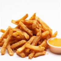 Zaab Fries · Crispy crunchy fries tossed in our homemade chili lime powder served with a side of spicy mayo
