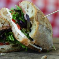 Fresh Mozzarella Sandwich · Fresh mozzarella, fire roasted red peppers, alfalfa sprouts, fresh greens, tomatoes, and bal...