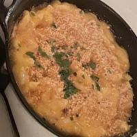 Cast Iron Mac & Cheese
 · Baked macaroni, cheddar and parmesan cheese, and crusted breadcrumbs.