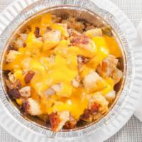 Home Fries With Cheese · Freshly made Potatoes mixed with onions and peppers and seasoned to perfection topped with m...