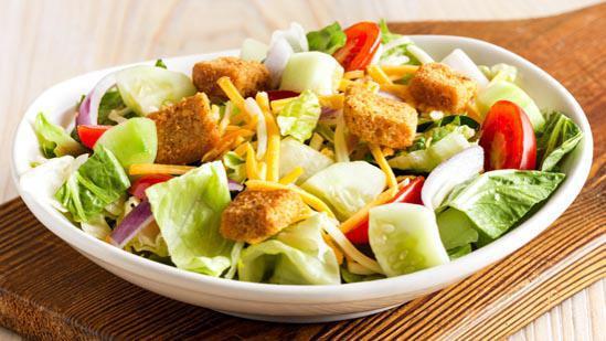 House Salad · Iceberg lettuce, tomato, onion, cucumber, green pepper and croutons.