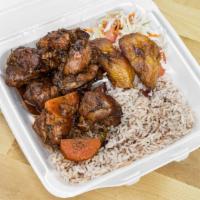 Stew Chicken · Served with choice of rice and peas or white rice , cabbage and plantains