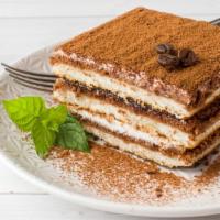 Tiramisu · Lady fingers delicately dipped in coffee and layered with a creamy mascarpone filling with a...