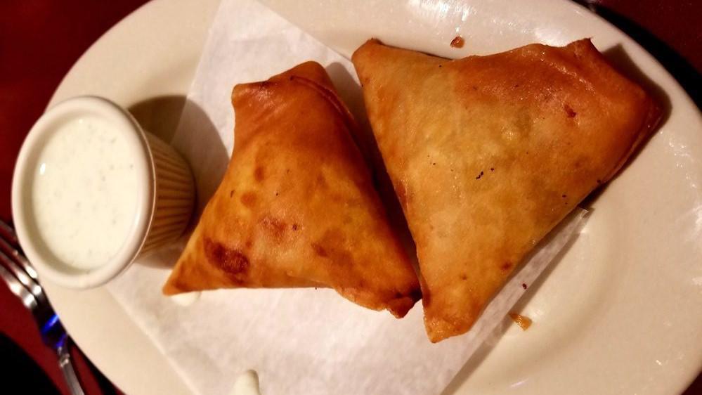 Meat Samosa · Crisp patties filled with mildly spiced chicken meat.