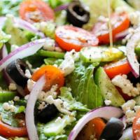 Greek Salad · Lettuce, feta, tomato, olives, cucumbers & onions.