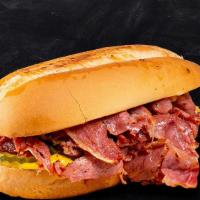 Pastrami Combo · Grilled pastrami & corned beef, melted Swiss cheese, coleslaw, Russian dressing.
