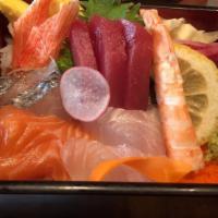 Chirashi · Assorted fish over sushi rice. Served with miso soup.