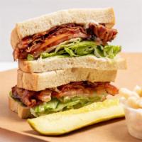 Blt Sandwich · Bacon, lettuce, tomato, and mayonnaise. Served with pickle and side of macaroni, potato, or ...