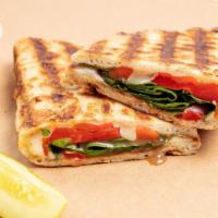 Tuscan Panini · Fresh mozzarella, roasted pepper, baby spinach, oregano, and creamy balsamic. Served with pi...