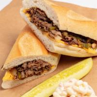I'M American Sandwich · Philly steak, grilled onions, grilled pepper, mushroom, and American cheese on a hero. Serve...