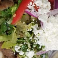 Greek Salad · Lettuce, tomato, cucumbers, green pepper, onion, olives, feta cheese & balsamic vinaigrette ...