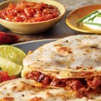Beef Quesadilla · Flour tortilla stuffed with ground beef, pico de gallo and blend of cheese