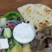 Lamb Gyro Platter  · Served with Greek salad and your choice of pita, lemon potatoes,rice,fries,or roasted vegeta...