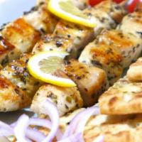 Chicken Souvlaki Platter (3 Pcs) · Served with Greek salad and your choice of pita, lemon potatoes or rice