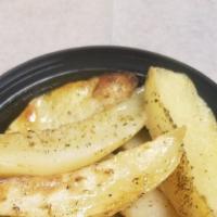 Lemon Potatoes · Lemon salt black pepper olive oil rosemary mustard and garlic.