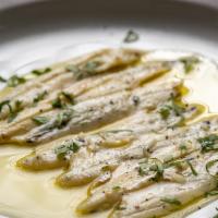 Boquerones · White anchovies, olive oil, garlic on country bread.