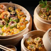 Dumpling N' Dips Party Platters (10 Pcs) · Most popular dumplings party set. 1 Mushroom Taro, 1 Chive, 1 Chicken, 1 Pork, 1 Pork and Se...