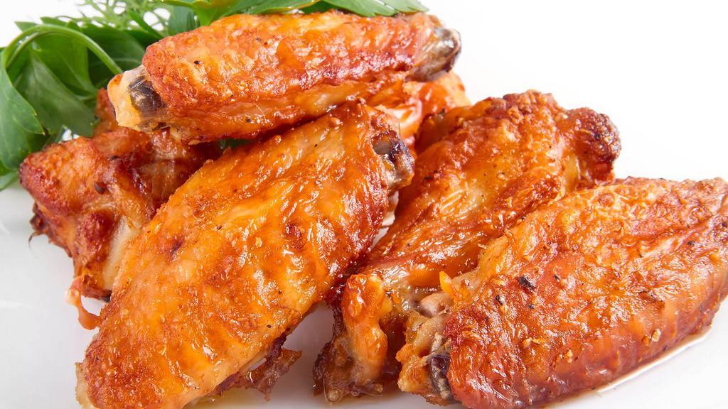 Honey Bbq Wings · Delicious traditional wings tossed in honey BBQ sauce made to perfection.