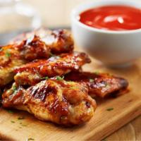 Spicy Bbq Wings · Delicious traditional wings tossed in spicy BBQ sauce made to perfection.