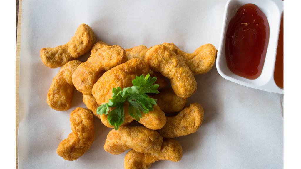 Bbq Boneless Wings · Golden fried, crispy boneless wings with sweet and smoky BBQ sauce and your choice of dipping sauce.