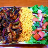 Bbq Chicken Over Rice · Serve with lettuce, tomatoes and fry onions, peppers, white sauce, hot sauce.