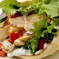 Regular Grill Chicken Wrap · Serve with cheese, mayonnaise, lettuce, tomatoes, fry onion, and peppers.