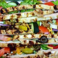 Grilled Chicken Salad · Served with lettuce, tomatoes, cucumbers, onion, and green pepper.