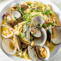 Linguine And Clams · White Wine, Garlic, Chopped Clams, Cockles