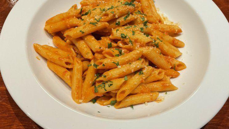 Penne Alla Vodka · Penne pasta prepared al dente in our creamy vodka sauce with peas. Add chicken and shrimp for an additional charge.