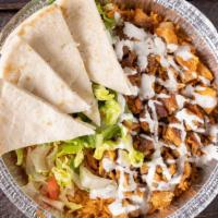 Chicken Shawarma  Platter · Served with chicken, rice, lettuce, and tomatoes along with your choice of toppings and our ...