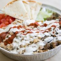 Gyro Platter · Served with lamb gyro, rice, lettuce, and tomatoes along with your choice of toppings and ou...