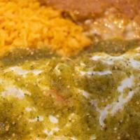 El Burrito Verde · Special pork meat burrito topped with green avocado salsa. Served with rice, beans and pico ...