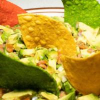 Guacamole Azteca · Diced fresh avocados mixed with onions, tomatoes, cilantro, jalapeÃ±o peppers and lime.