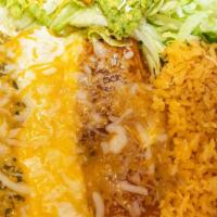 La Mi Patria · Three enchiladas, one chicken with cheese sauce, one beef with green sauce, and one cheese w...