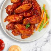 Hots For Habanero Wings  · Fresh chicken wings breaded, fried until golden brown, and tossed in mango habanero sauce. S...