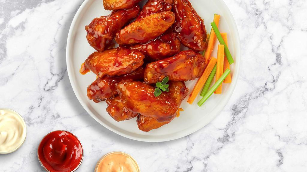 Hots For Habanero Wings  · Fresh chicken wings breaded, fried until golden brown, and tossed in mango habanero sauce. Served with a side of ranch or bleu cheese.