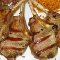 Lamb Chops · Baby lamb chops char-grilled to your taste.