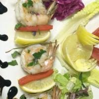 Wild Shrimp Shish Kebab · Char-grilled wild jumbo shrimps served with mixed greens.