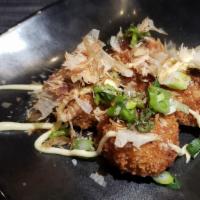 Panko Crusted Takoyaki · 4 pieces - Panko Crusted Takoyaki | Kewpie Mayo | Okonomi Sauce | Bonito Flakes
(Contains Sh...
