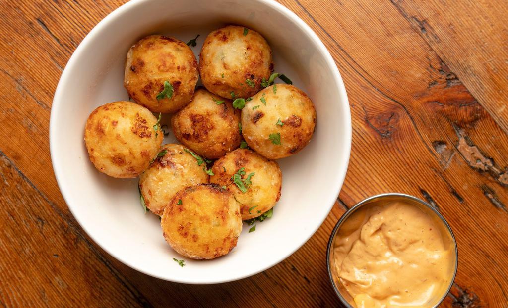 Castello Tots · Cheddar, chives and Idaho potatoes. Served with chipotle aioli.