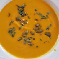 Butternut Squash Soup · Roasted pumpkin seeds, fresh tarragon, chicken broth.