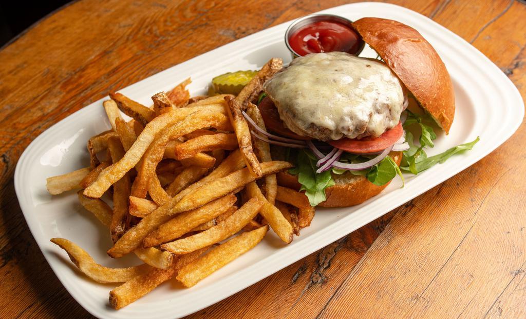 Burger · Grass-fed beef hamburger, with tomato, red onion, and arugula on a brioche bun with chive aioli and dill pickles. Served with fries or salad.