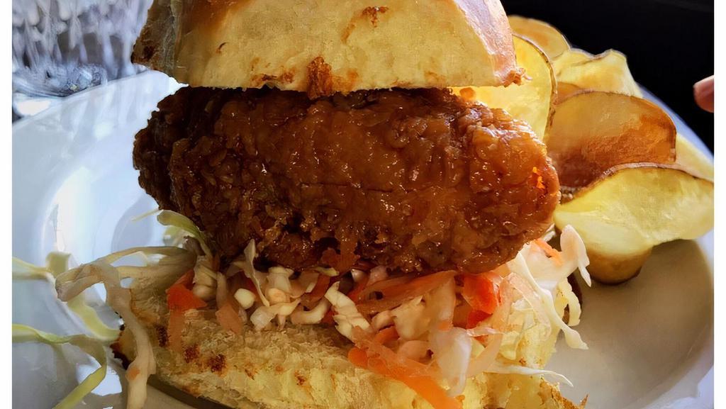Fried Chicken Sandwich · Coleslaw and dill pickles on a brioche bun. Served with fries or salad.