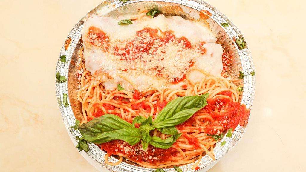 Chicken Parmigiana · Served with choice of pasta in tomato sauce or a garden salad.