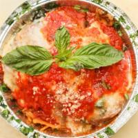 Eggplant Parmigiana · Served with choice of pasta in tomato sauce or a garden salad.