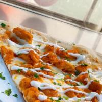 Buffalo Chicken Pizza Slice · Buffalo chicken cutlet, imported finest grande mozzarella topped with creamy ranch.