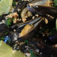 Drunken Mussels · In a blue moon, bacon, ginger, cilantro, mustard and scallion broth.