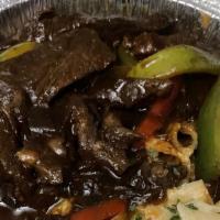Pepper Steak · Served with your choice of rice or Rasta pasta and a choice of garden salad or steamed veget...